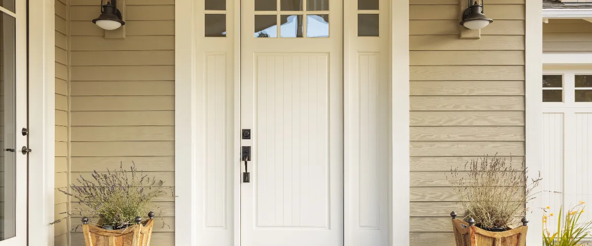 The front of a house with light tan or beige siding