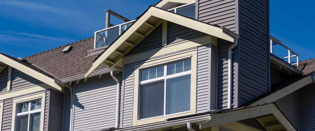 the exterior roofline and siding of a residential building